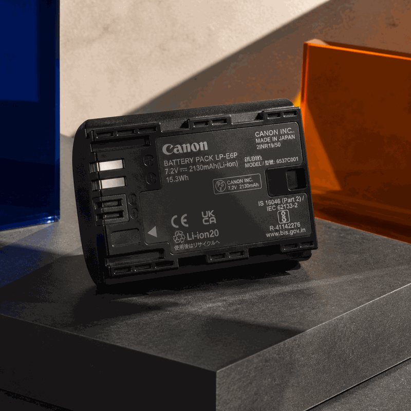 Canon LP-E6P Battery photographed on the cobalt, orange and charcoal FRAMEHAUS studio stage
