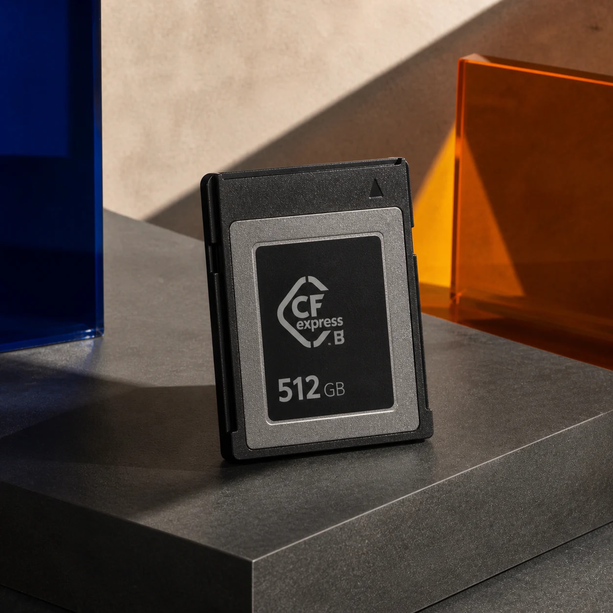 CFexpress Card — 512GB photographed on the cobalt, orange and charcoal FRAMEHAUS studio stage