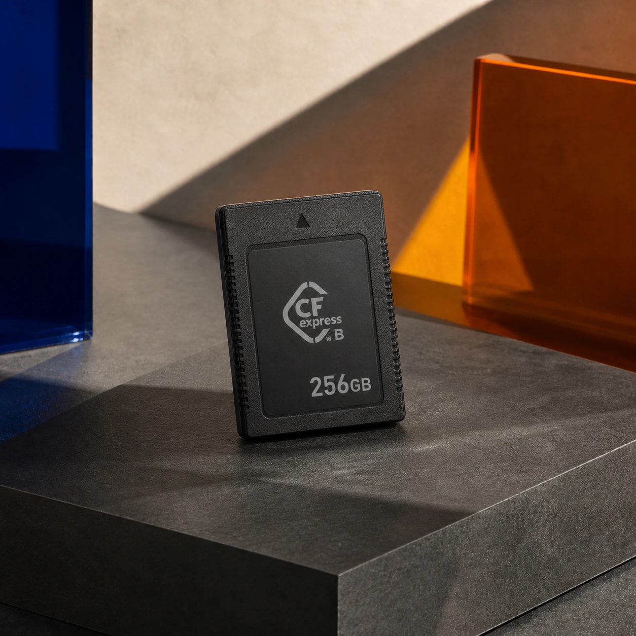 CFexpress Card — up to 256GB photographed on the cobalt, orange and charcoal FRAMEHAUS studio stage