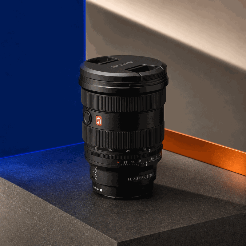 Sony FE 16-35mm F2.8 GM II wide zoom lens on a blue, orange and black FRAMEHAUS set